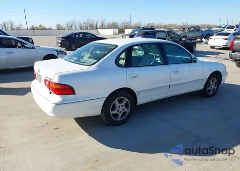 1999 Toyota Avalon Xl from USA, damaged, VIN 4T1BF18B0XU317004